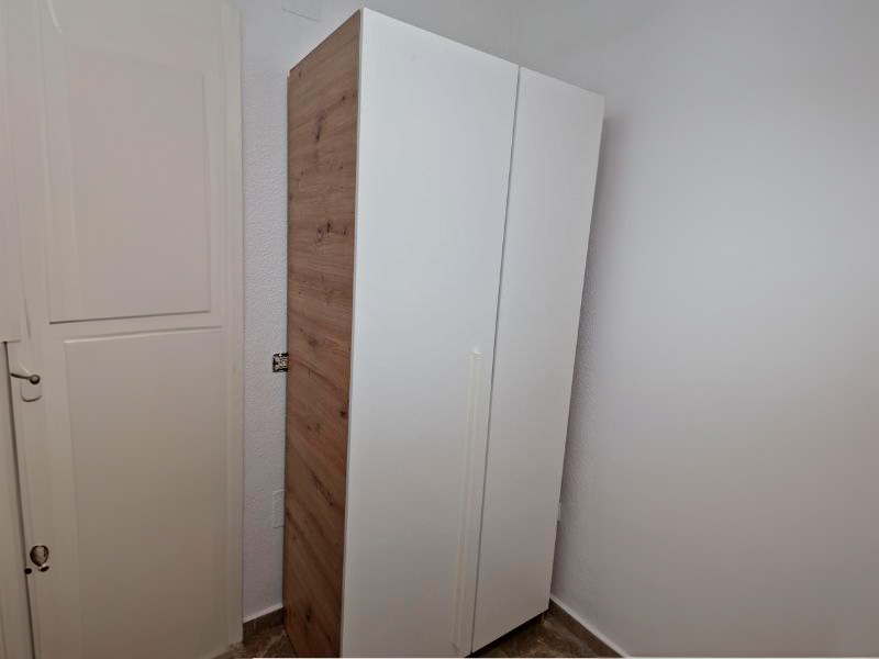 Foto de cliente de Armario Juvenil Noa 2 Puertas Color Roble Nodi Y Blanco Artik 90x200 cm