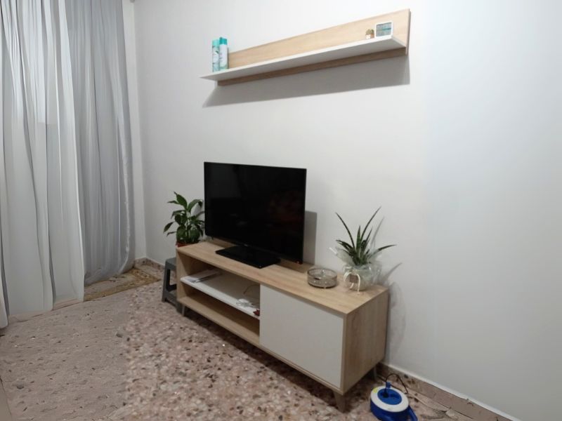 Foto de cliente de Mueble para TV Kikua Plus 135 cm con estante roble y blanco salón